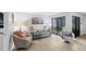 Spacious living room with tile floors, comfortable seating, and natural light at 801 Spring Lakes Blvd # 801, Bradenton, FL 34210