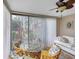 Bright sunroom with plenty of windows providing great backyard views at 801 Spring Lakes Blvd # 801, Bradenton, FL 34210