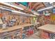 Spacious workshop with pegboard walls, workbenches, tools and ample storage space at 805 Mcarthur Ave, Sarasota, FL 34243