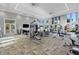 Bright gym with state-of-the-art equipment and expansive windows overlooking beautiful views at 8901 Artisan Way, Sarasota, FL 34240