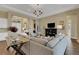 Cozy living room with stylish decor, elegant furnishings, and natural light at 8901 Artisan Way, Sarasota, FL 34240