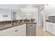 The well-designed kitchen features granite countertops, stainless steel appliances, and ample counter space at 9415 Discovery Ter # 101A, Bradenton, FL 34212