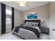 Bedroom featuring modern decor, neutral wall colors, and comfortable furnishings at 1113 Cane Mill Ln, Bradenton, FL 34212