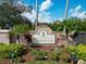 The stone sign for Greenfield Plantation is placed in a beautifully landscaped area near the golf course at 1113 Cane Mill Ln, Bradenton, FL 34212