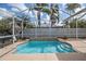 Private screened in pool, perfect for relaxation and recreation, complete with a playful rubber ducky float at 1113 Cane Mill Ln, Bradenton, FL 34212