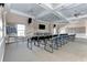 Meeting room featuring row seating, natural light, and AV capabilities at 1153 Edgewater Cir, Bradenton, FL 34209
