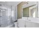Modern bathroom with marble walk-in shower and sleek vanity at 1155 N Gulfstream Ave # 1709, Sarasota, FL 34236