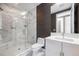 Sleek modern bathroom featuring a glass-enclosed shower and a vanity with a contemporary sink and fixtures at 1155 N Gulfstream Ave # 1709, Sarasota, FL 34236