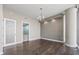 Bedroom with hardwood floors with an ensuite bathroom at 1155 N Gulfstream Ave # 1709, Sarasota, FL 34236