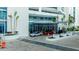 Attractive condominium entrance with mature landscaping and ample parking at 1155 N Gulfstream Ave # 1709, Sarasota, FL 34236