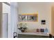 Building entryway with modern signage, stylish decor, and a welcoming atmosphere at 1155 N Gulfstream Ave # 1709, Sarasota, FL 34236