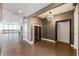 Modern condo entryway with a wine fridge and sleek flooring at 1155 N Gulfstream Ave # 1709, Sarasota, FL 34236