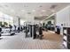 Fully equipped gym with cardio machines, weight training equipment, and mirrored walls for a complete fitness center at 1155 N Gulfstream Ave # 1709, Sarasota, FL 34236