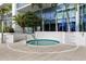 This modern hot tub is in a luxurious resort, near a high-rise condo, with access to spa rules at 1155 N Gulfstream Ave # 1709, Sarasota, FL 34236