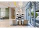 Elegant lobby featuring contemporary art, stylish seating, and abundant natural light at 1155 N Gulfstream Ave # 1709, Sarasota, FL 34236
