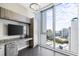 Bright office space features custom built-ins and a large window with a view of the waterfront and city at 1155 N Gulfstream Ave # 1709, Sarasota, FL 34236