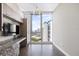 Bright office space features custom built-ins and a large window with a view of the waterfront and city at 1155 N Gulfstream Ave # 1709, Sarasota, FL 34236