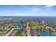 Aerial image showcases a neighborhood with mature landscaping, parks, and multiple ponds adding to the charm at 11603 Gramercy Park Ave, Bradenton, FL 34211