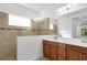 Beautiful bathroom showcasing a glass enclosed shower and vanity with double sinks at 11603 Gramercy Park Ave, Bradenton, FL 34211