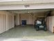 Spacious garage with golf cart, storage and ample parking at 1211 Peridot Lane, Sun City Center, FL 33573