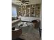 Stylish living room featuring modern furniture and built-in shelving perfect for relaxation at 1211 Peridot Lane, Sun City Center, FL 33573