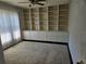 Versatile room features built-in shelving, drawers, and ample storage space at 1211 Peridot Lane, Sun City Center, FL 33573