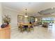 Cozy dining area with a round table, perfect for intimate meals and gatherings at 13214 Treviso Dr, Bradenton, FL 34211