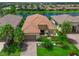 Stunning home with tile roof, lush landscaping, and charming curb appeal in a waterfront community at 13214 Treviso Dr, Bradenton, FL 34211