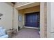 Elegant double front doors with stone accents and stylish decor enhance the home's entryway at 13214 Treviso Dr, Bradenton, FL 34211