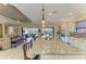 Expansive kitchen island featuring a large countertop, ideal for dining and entertaining at 13214 Treviso Dr, Bradenton, FL 34211