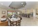 Open-concept living room with a seamless flow to the kitchen and outdoor spaces at 13214 Treviso Dr, Bradenton, FL 34211