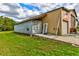 Exterior shot of a metal barn with storage container at 15890 County Road 675, Parrish, FL 34219