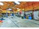 Massive garage space with equipment, ample storage, and great lighting for any project at 15890 County Road 675, Parrish, FL 34219