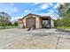 Large detached garage with multiple bays, custom paint, and room for projects and storage at 15890 County Road 675, Parrish, FL 34219