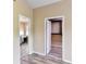 Hallway with a large closet and entrance to the primary bathroom at 15890 County Road 675, Parrish, FL 34219