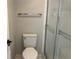 This bathroom is complete with a walk-in shower and white tile surround at 1697 Brookhouse Cir # 116, Sarasota, FL 34231