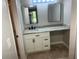 Bathroom vanity featuring granite counters, ample storage, and framed mirrors in a neutral palette at 1697 Brookhouse Cir # 116, Sarasota, FL 34231