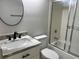 Updated bathroom with new vanity, modern sink and faucet fixtures and walk-in shower at 1697 Brookhouse Cir # 116, Sarasota, FL 34231