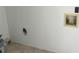 Laundry room hookups showing the connections for a washer and dryer at 1697 Brookhouse Cir # 116, Sarasota, FL 34231