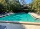 A view of a community pool at 1697 Brookhouse Cir # 116, Sarasota, FL 34231
