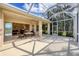 Spacious lanai offering seamless indoor/outdoor living and beautiful backyard views at 1720 85Th Nw Ct, Bradenton, FL 34209