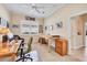 Well-lit office space with natural light, neutral carpet, and multiple workspaces at 1720 85Th Nw Ct, Bradenton, FL 34209
