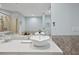 Elegant bathroom vanity with quartz countertop, modern bowl sink, and a walk-in shower with neutral tiling at 1771 Ringling Blvd # 1001, Sarasota, FL 34236