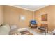 Comfortable office space with cozy seating, a tv, and neutral decor at 1945 Gulf Of Mexico Dr # M2-516, Longboat Key, FL 34228