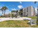 A playground sits in front of the building, offering a fun outdoor space for children at 1945 Gulf Of Mexico Dr # M2-516, Longboat Key, FL 34228