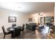 Open living room featuring modern furniture and natural light at 19962 Benissimo Dr, Venice, FL 34293