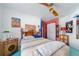 Bedroom features light blue painted flooring and a wooden bed at 215 Santarem Cir, Punta Gorda, FL 33983