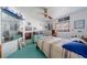 Cozy bedroom with a large mirror, a double bed, and natural light at 215 Santarem Cir, Punta Gorda, FL 33983