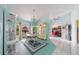 Dining area with a chandelier, a hutch, unique design, and plenty of natural light at 215 Santarem Cir, Punta Gorda, FL 33983