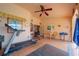 Patio space featuring a treadmill, table, and chairs at 215 Santarem Cir, Punta Gorda, FL 33983